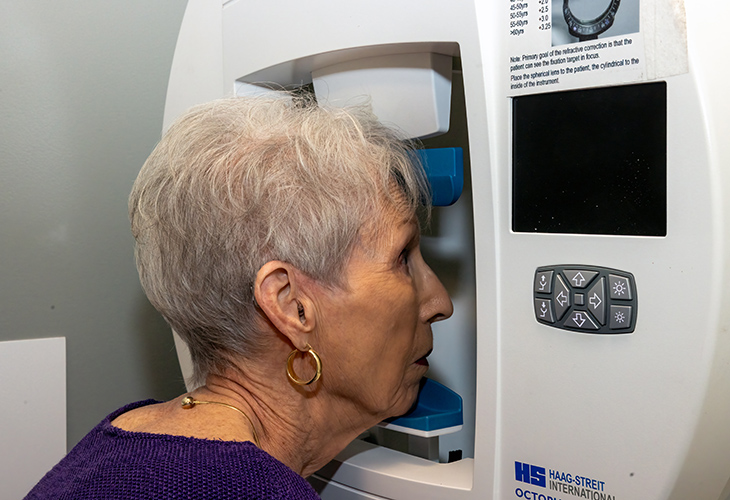 Lady is doing eye exam