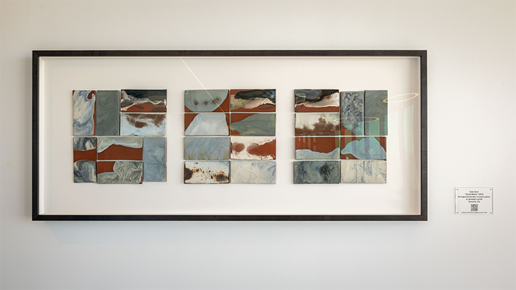 Close up of the Cloud Matrix art piece hanging on a white wall.