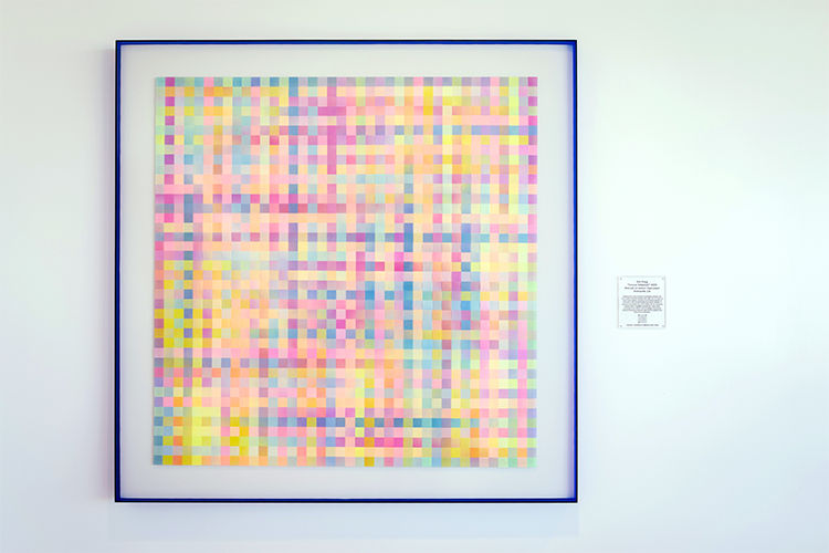 Close up of the Forever Entwined art piece hanging on a wall.