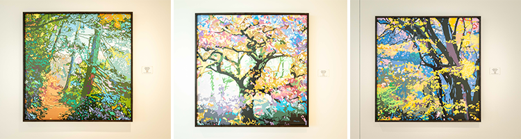 Triptych of Day Trippin 2, In Dreams 2 and Sacred Grove 2 art pieces hanging on the wall.