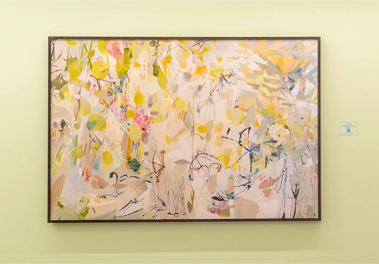 Close up of the We Walked for Days art piece on a light green wall.