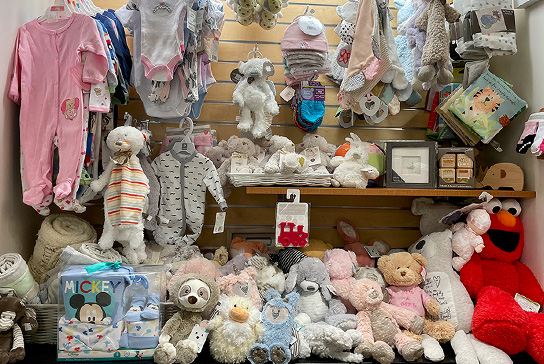 A large display filled with stuffed animals of all kinds.