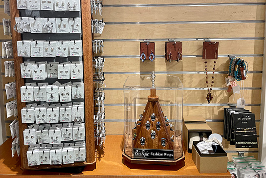 A display of assorted jewelry and cards in the UC Davis Medical Center gift shop.