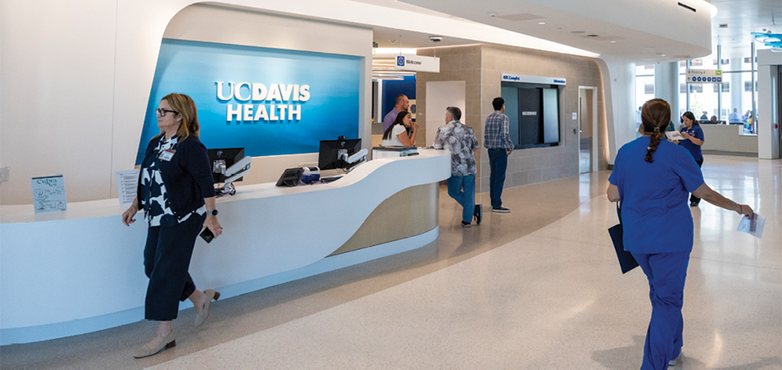 People walking through the 48X Complex outpatient surgery center lobby.
