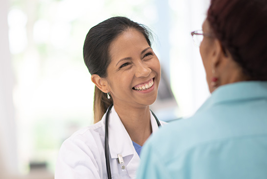 Doctor comforts patient