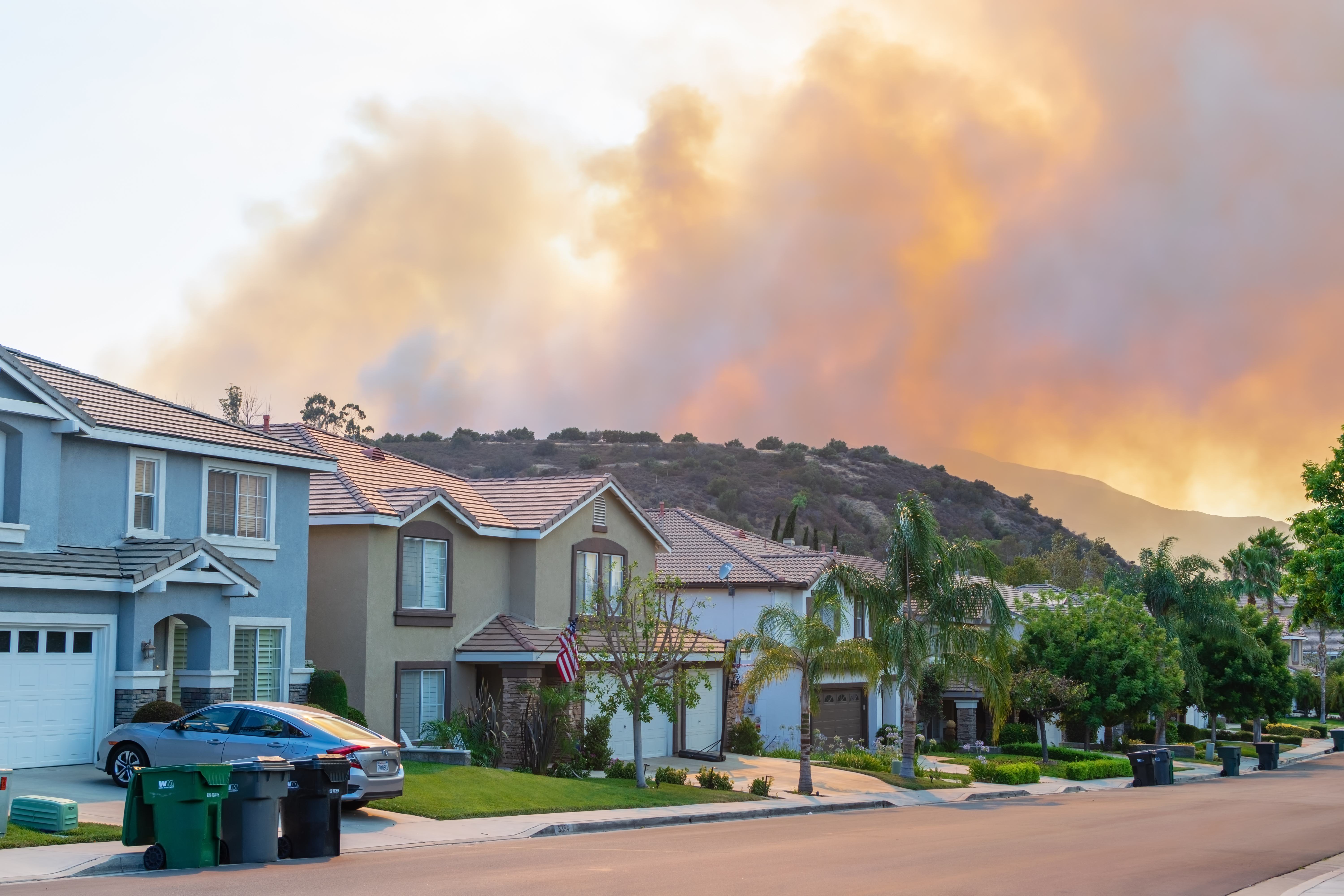 Wildfire smoke near residential area.