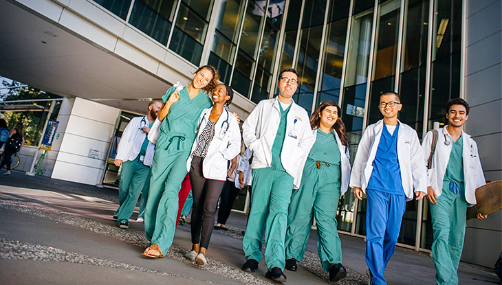 Students walking outside the School of Medicine building
