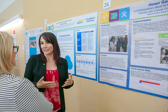Nurse presenting a poster