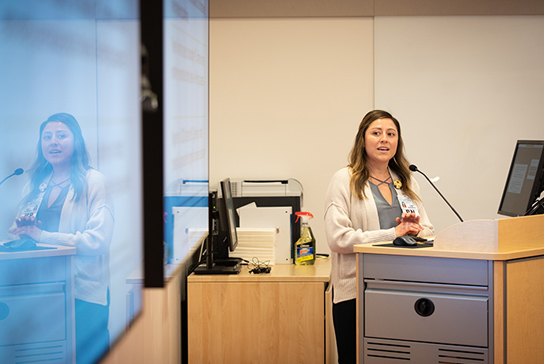Nurse presenting at the podium