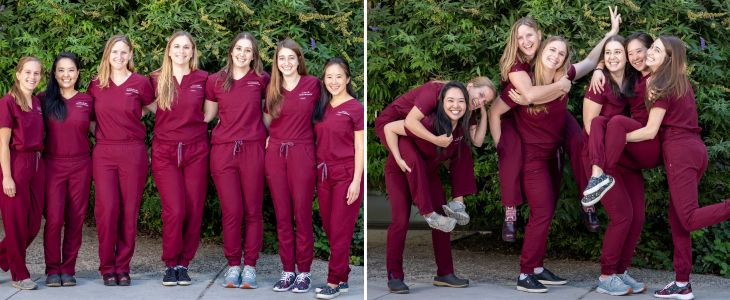 Photo of 2024 OBGYN residents smiling in front of trees and bushes. 