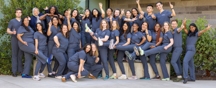 Group photo of OBGYN residents outdoors at the UC Davis Health Sacramento campus.