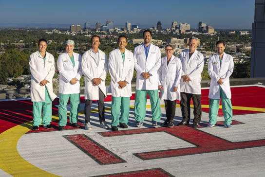 Group of trauma surgeons standing on a helipad