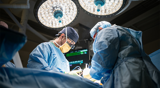 Dr. Mineyev in the operating room perfroming a living donor kidney transplant surgery.