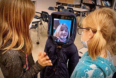 Pediatric patient uses robot and screen to talk to classmates