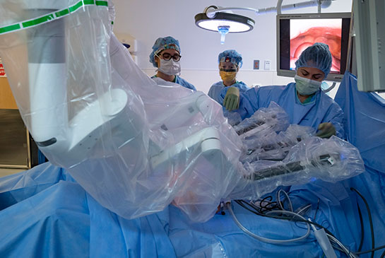 Robotic-assisted surgery for children, robotic arms in action.