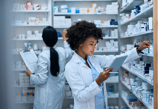 Pharmacists checking on medicine