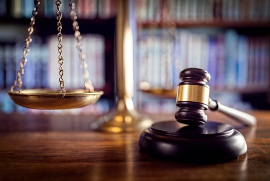 A gavel sits on a desk