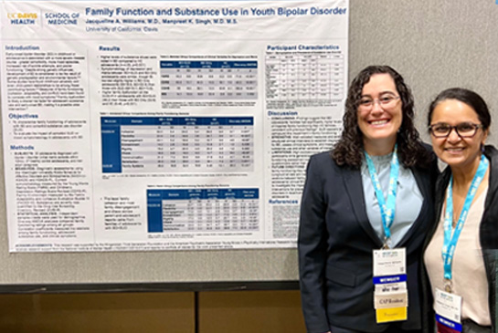 Resident and Manpreet Kaur Singh present a poster