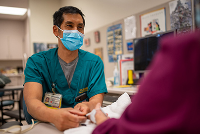 physician's assistant Consulting with patient