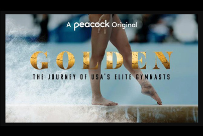 Gymnast walking across a balance beam with the title "Golden" superimposed across the screen.