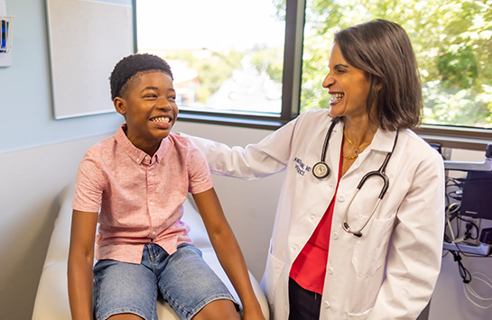 UC Davis Health primary care doctor with pediatric patient