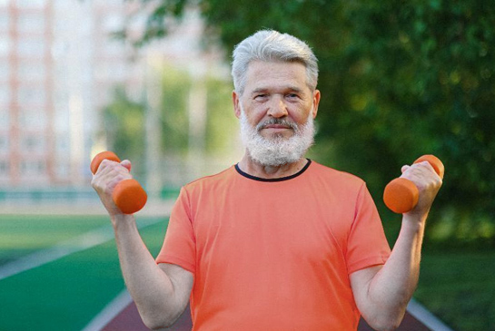 A man holding dumbbells