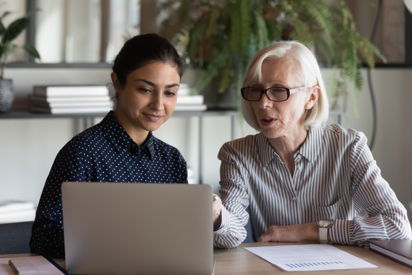 professor working with a student