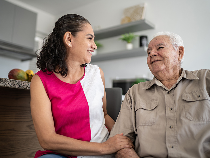 caregiver taking care of a senior man