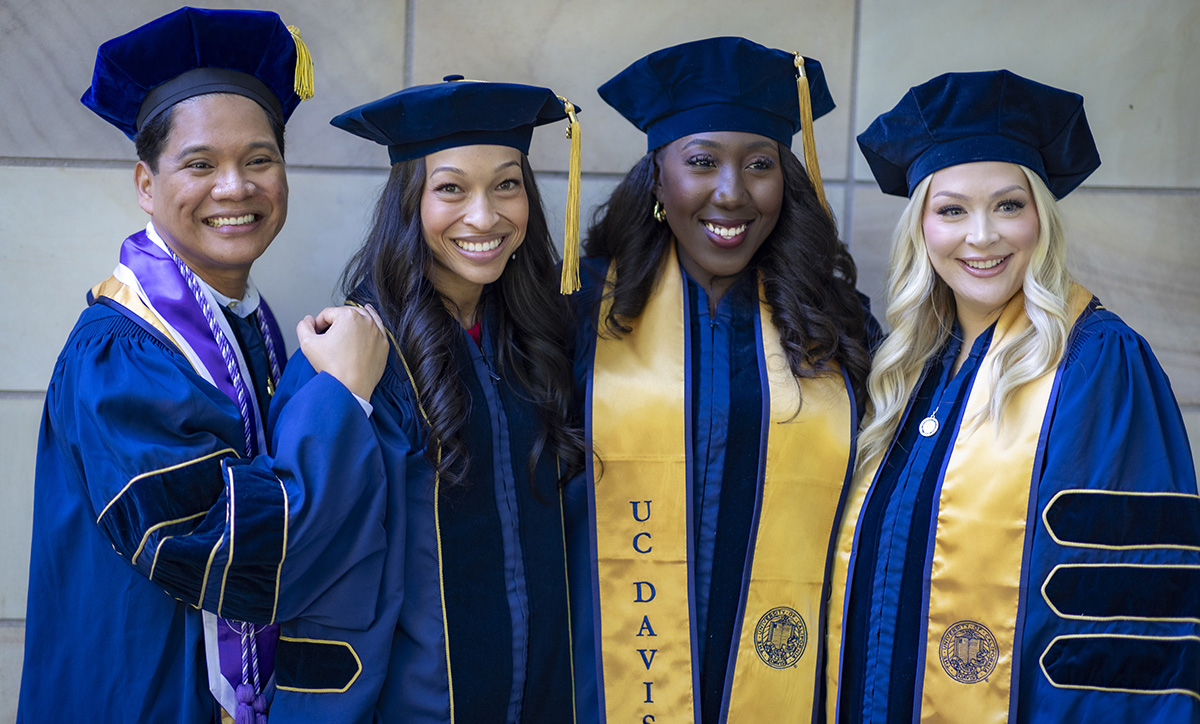 Graduating students gather outside of the Mondavi Center for a photo opportunity following their commencement ceremony in 2025.