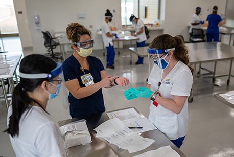  A clinical instructor works with Master’s Entry Program in Nursing students.