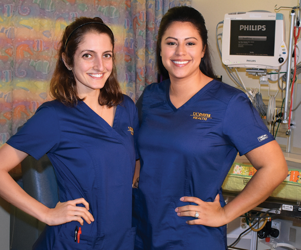 Alana Matarazzo, left, and Brooke-Ashley Cook, graduates of the Master’s Entry Program in Nursing inaugural class, are now both nurse residents in the neonatal intensive care unit at UC Davis Medical Center.