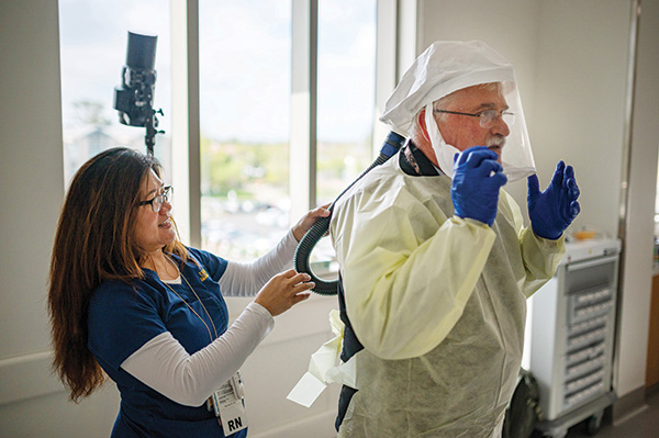 Amie Ragasa-Sta Maria, a 2020 graduate of the master's leadership program and an infection prevention nurse at UC Davis Medical Center, was a PPE expert for a video and photo shoot at UC Davis Health to share best practices using PPE.