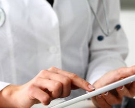 doctor with ipad, stock image
