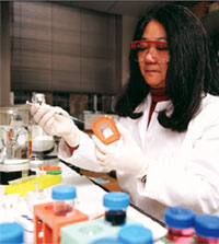 PHOTO — Suzanne Miyamoto, in her lab at UC Davis Medical Center, works on a potential screening test for ovarian cancer.
