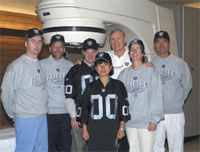 PHOTO — On the day he completed prostate cancer treatment, Jim Otto arrived with jerseys and sweatshirts for his UC Davis Cancer Center team.