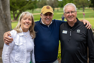 Joe Tuscano (middle) with the founders of 
Sunday on the Green, Nicki and Loel Heupel.