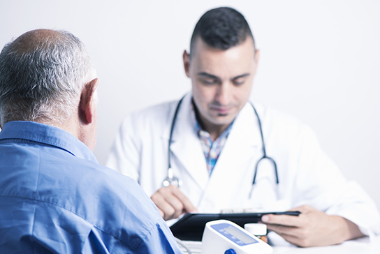 doctor with patient checking information